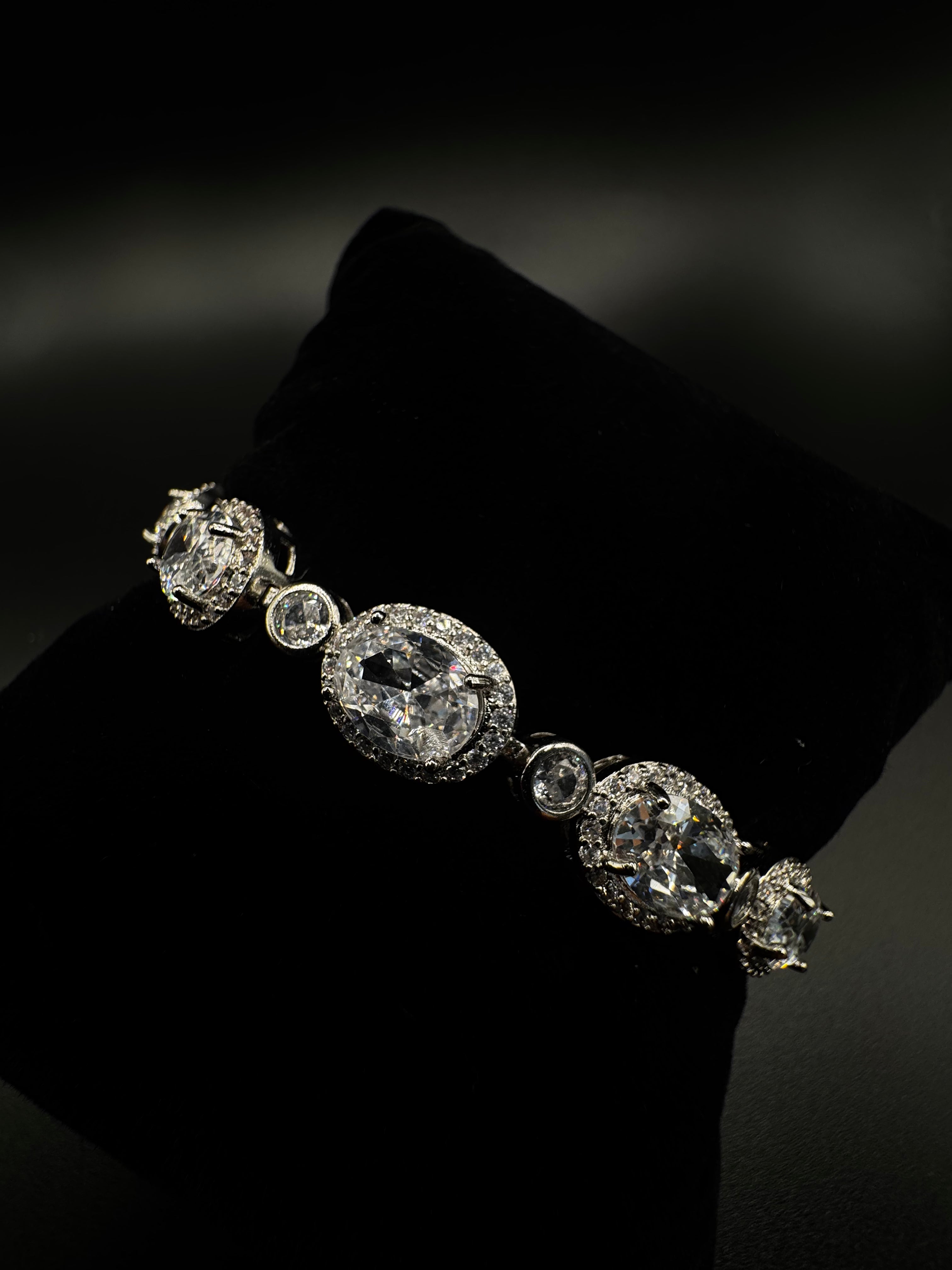 Rhodium-plated bracelet with clear oval zirconia stones
