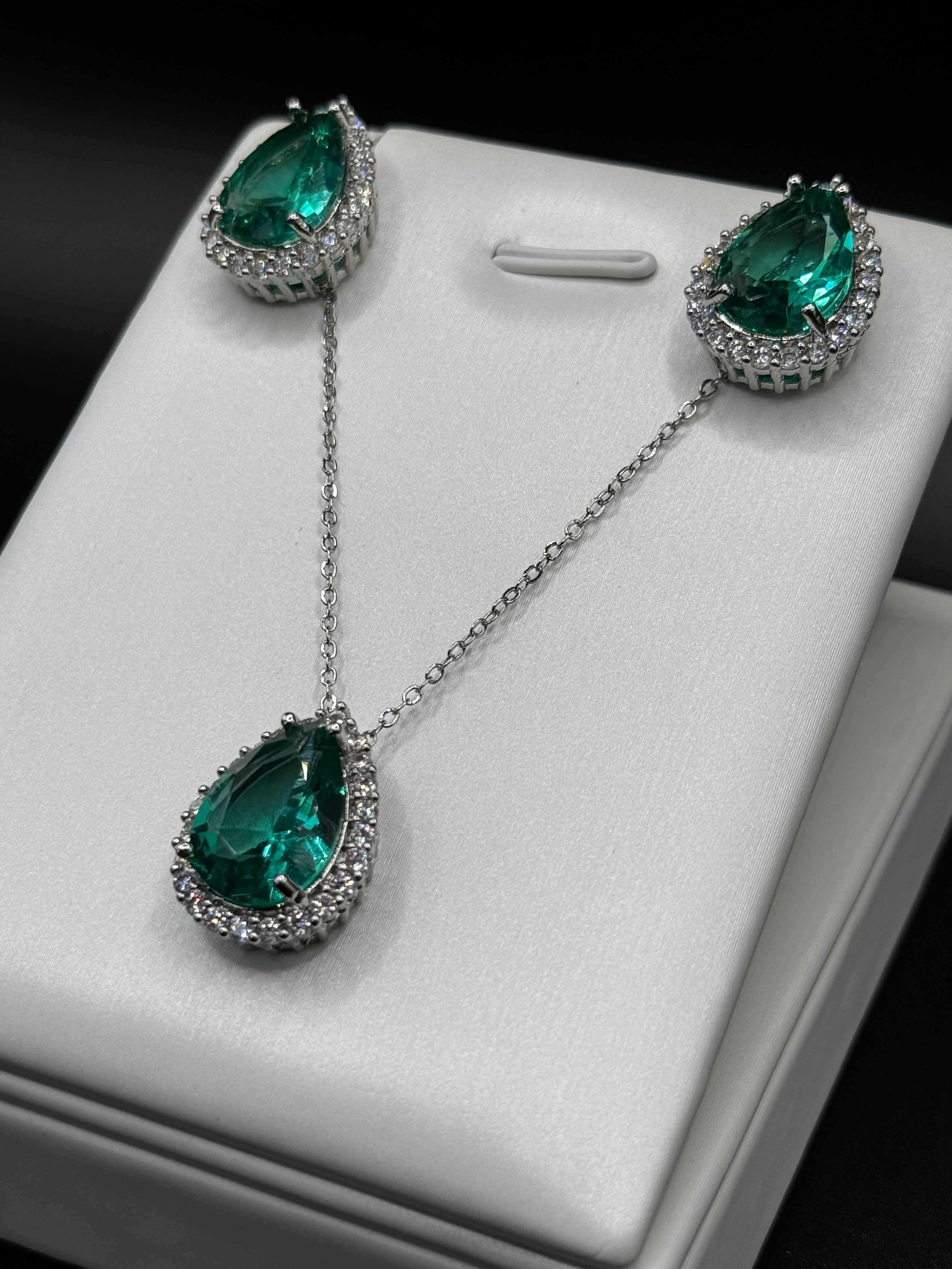 Rhodium-plated jewelry set with a teardrop-shaped tourmaline pendant