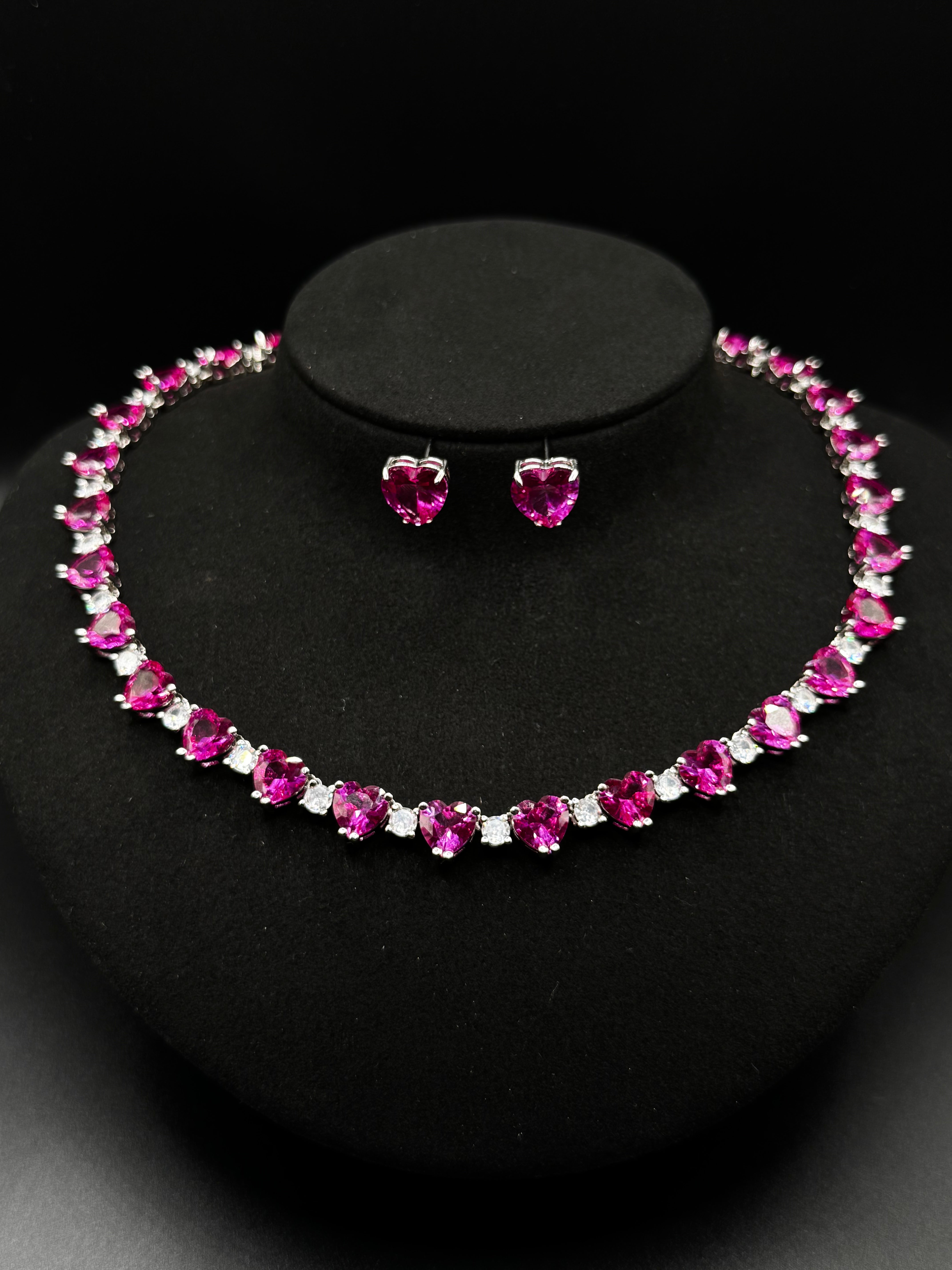 Luxury rhodium-plated Riviera set with heart-shaped pink sapphires