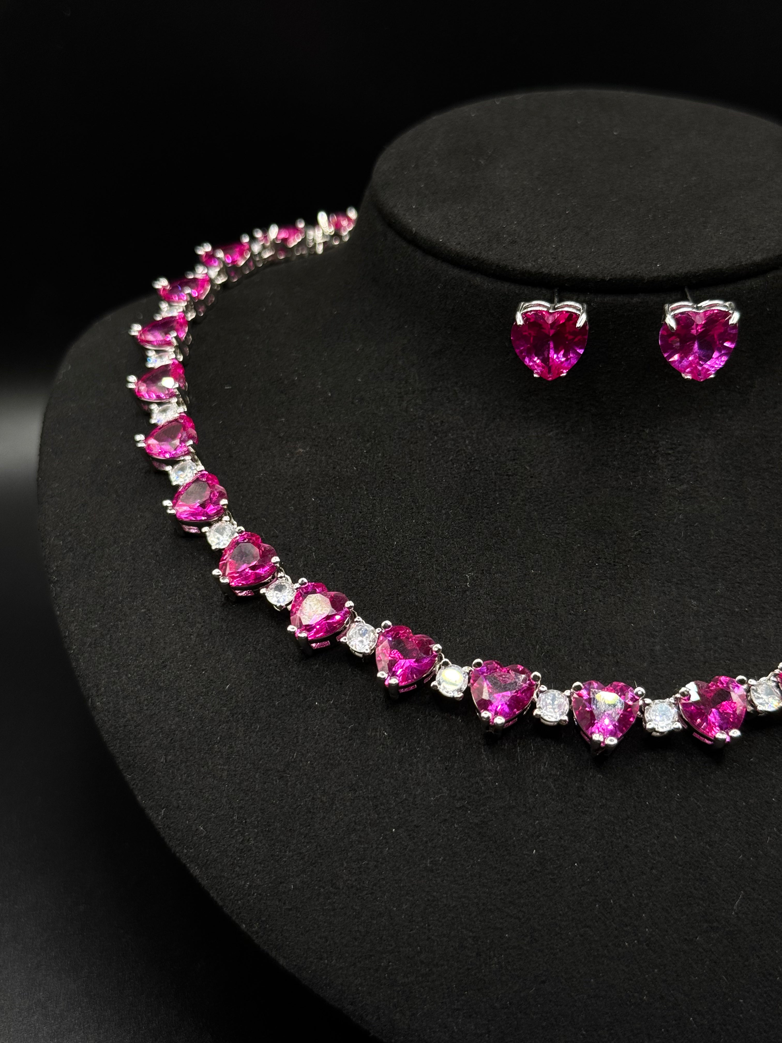 Luxury rhodium-plated Riviera set with heart-shaped pink sapphires
