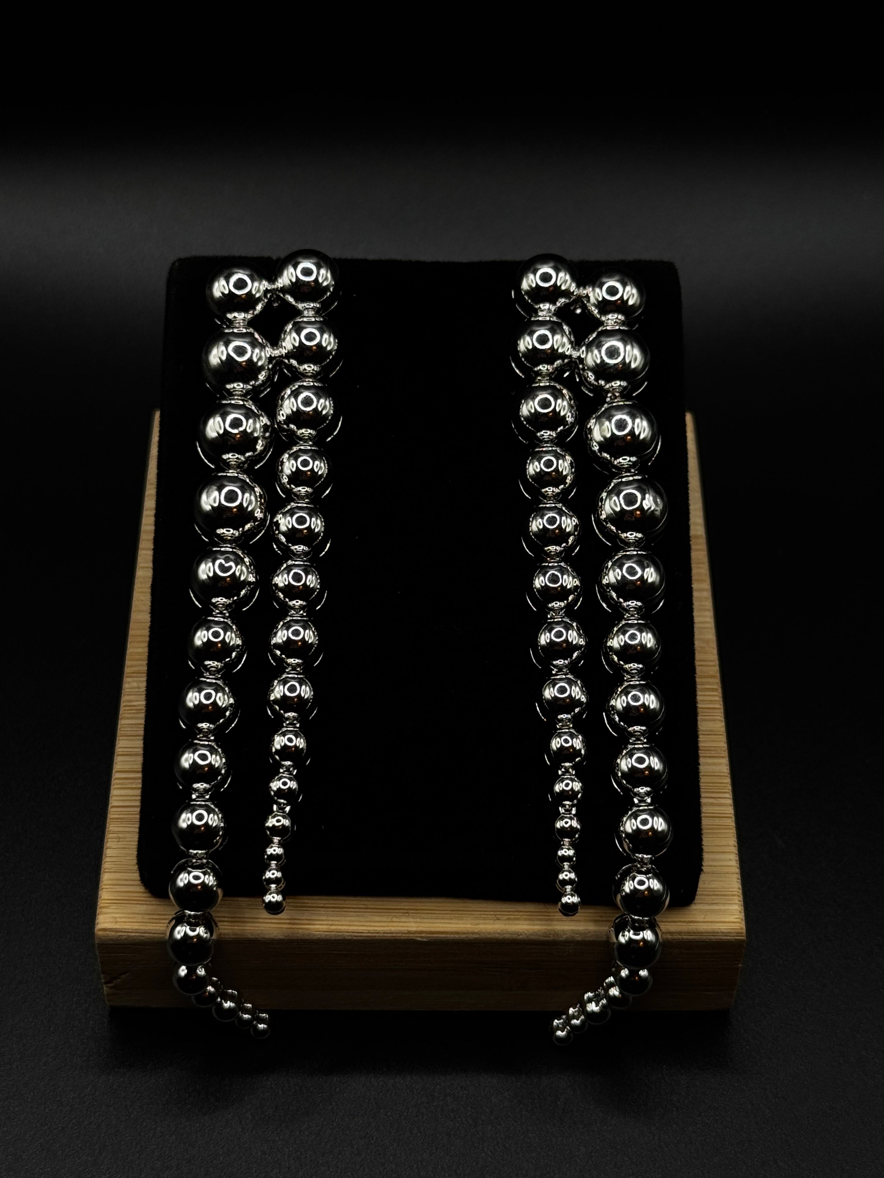 Long sphere earring plated