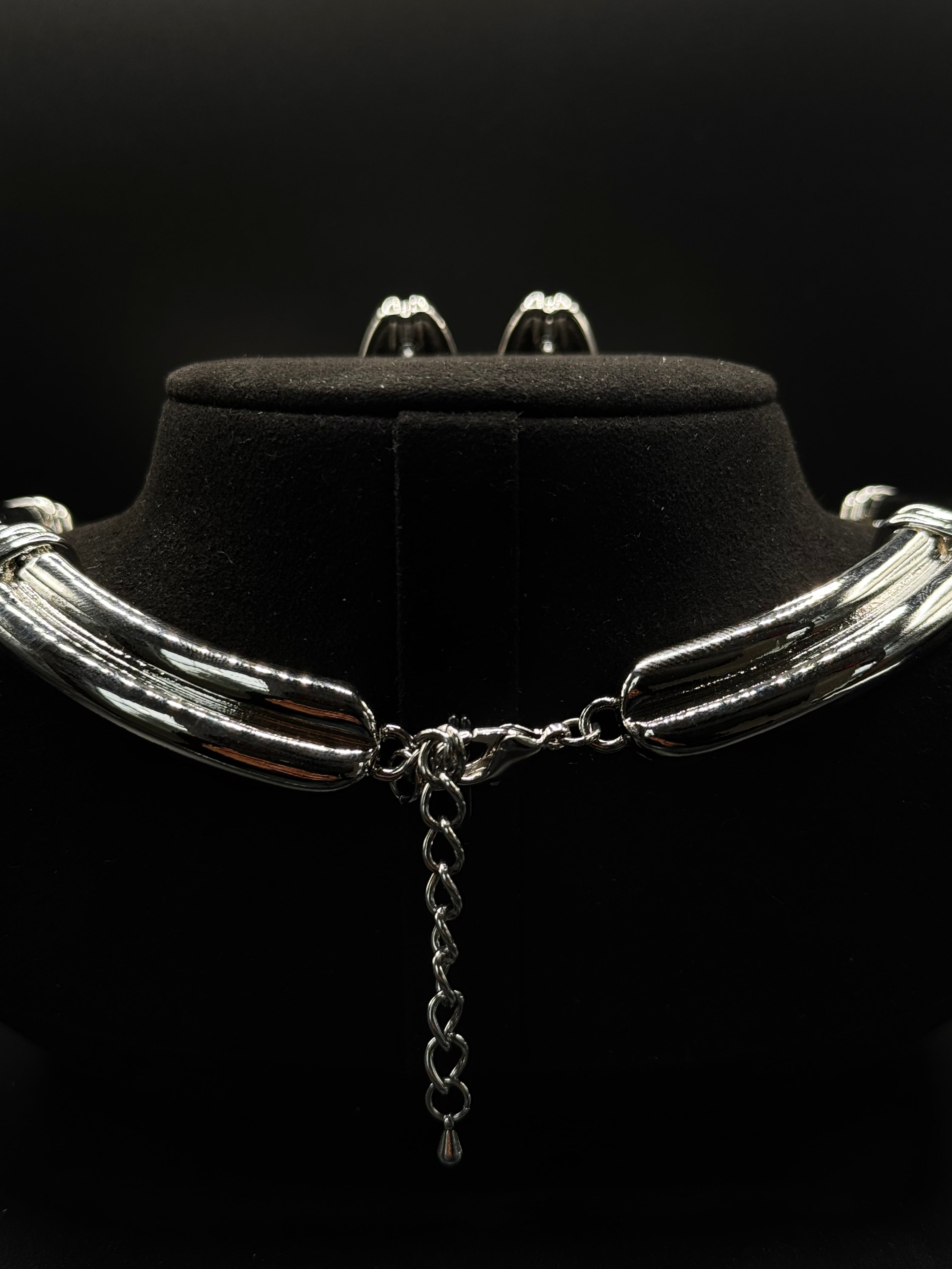 Rhodium-plated choker set featuring delicate details encrusted with clear zirconia