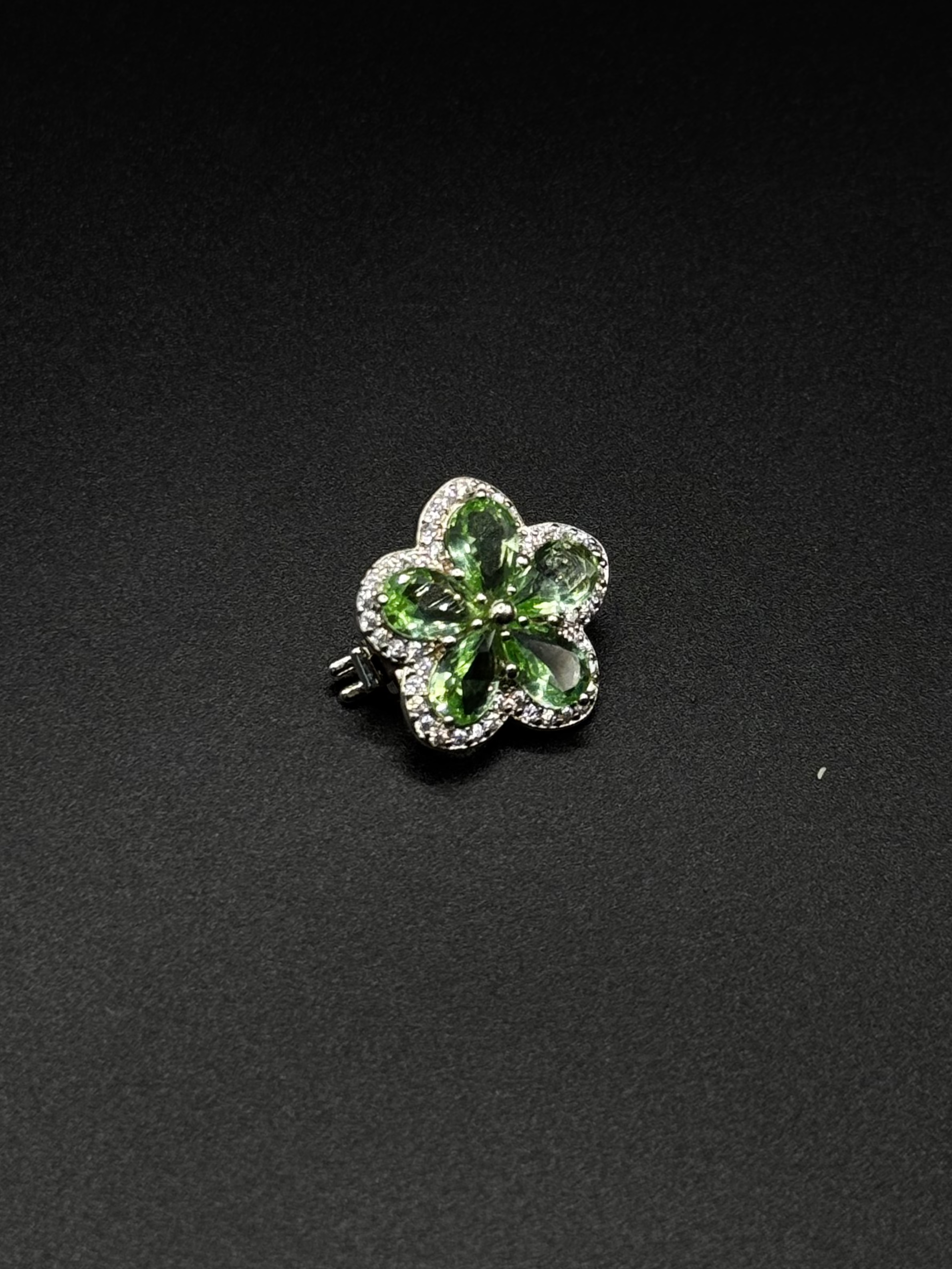 Flower Charm with Cubic Zirconia Around It