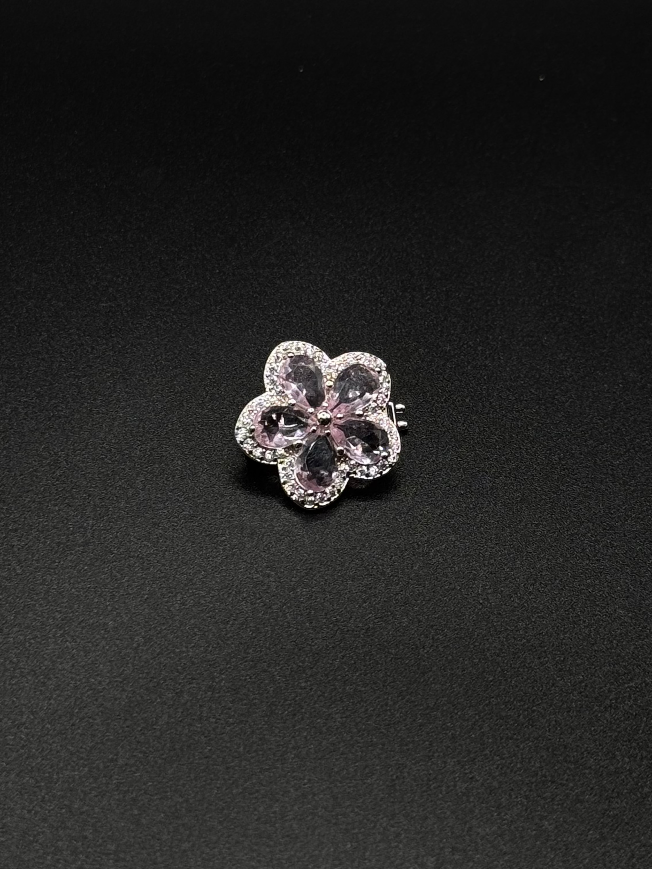 Flower Charm with Cubic Zirconia Around It