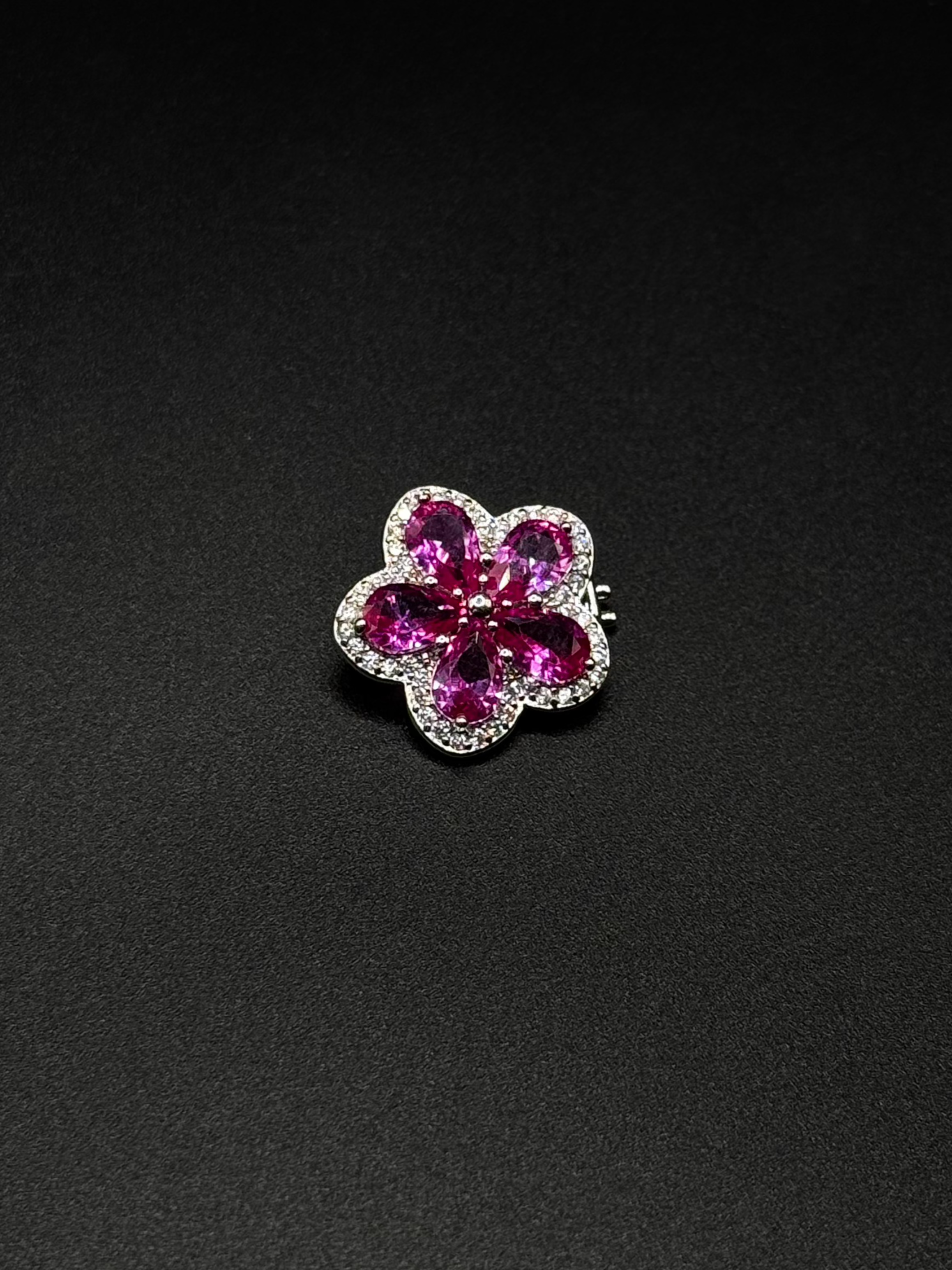 Flower Charm with Cubic Zirconia Around It